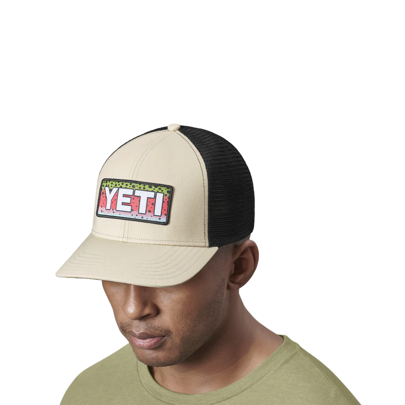 http://twinpeakesflyfishing.com/cdn/shop/files/YETI_1H22_Hats_Rainbow_Trout_Logo_Badge_Trucker_Cream_On-Body_3Qtr_1469_Layers_F-2400x2400_png_1200x1200.webp?v=1687987209